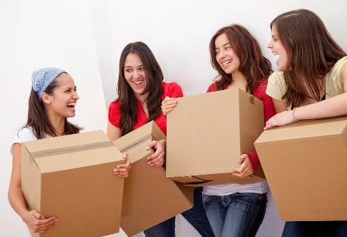 Experienced removalist team packing furniture