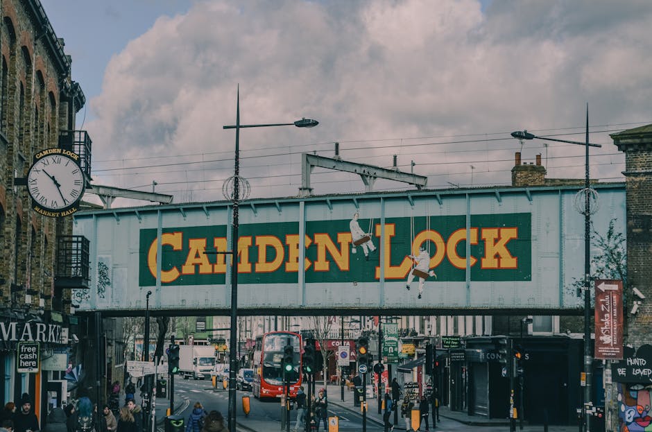 Close-up view of a brick building corner displaying two street signs, one labeled 'Carey Street' and the other 'Star Yard,' both with the Camden Council logo and WC2 postal code. The signage is mounte